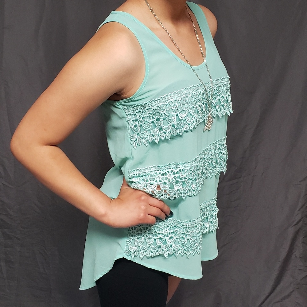 Sleeveless Teal colored Top